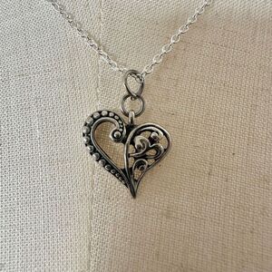 Silver tone heart pendant necklace